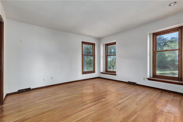 empty room featuring light wood-type flooring