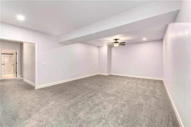 unfurnished room with carpet flooring and ceiling fan