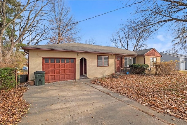 single story home featuring a garage