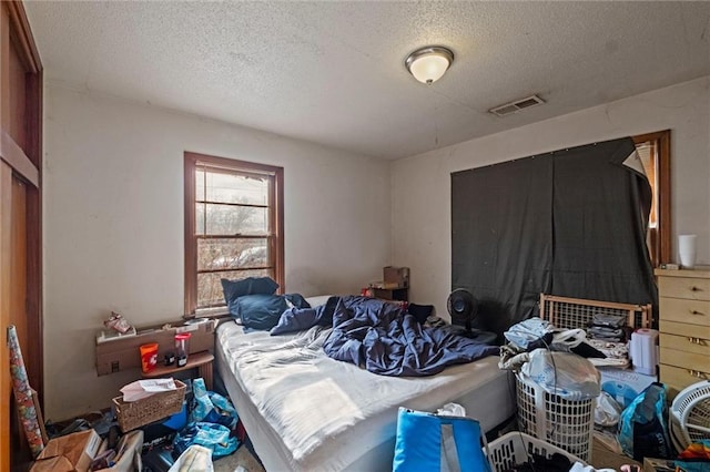 bedroom with a textured ceiling