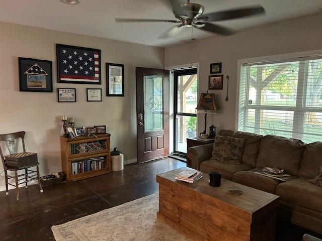 living room with ceiling fan