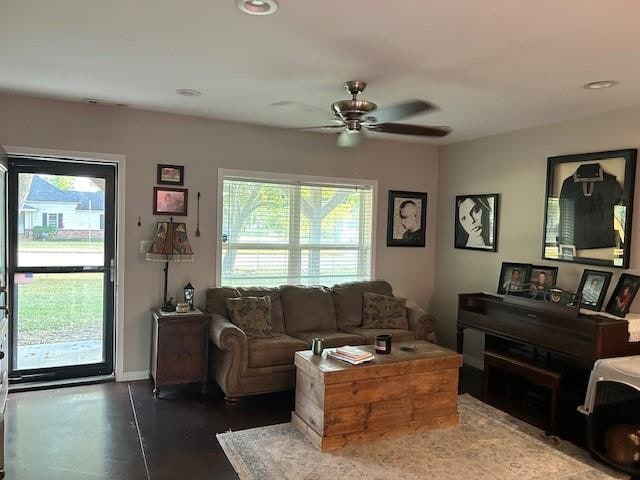 living room featuring ceiling fan