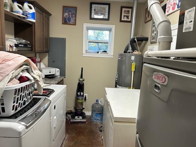 laundry area with heating unit, gas water heater, electric panel, cabinets, and washing machine and dryer