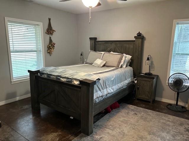 bedroom with multiple windows and ceiling fan