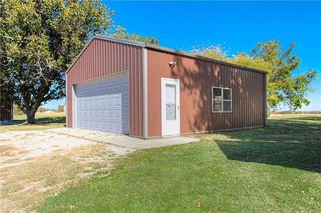 garage with a lawn