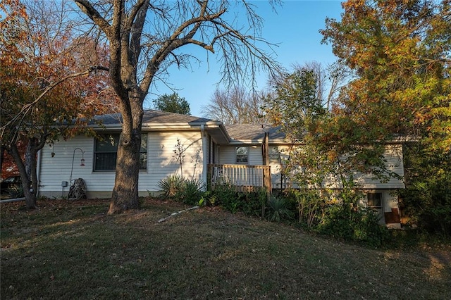 exterior space with a front lawn