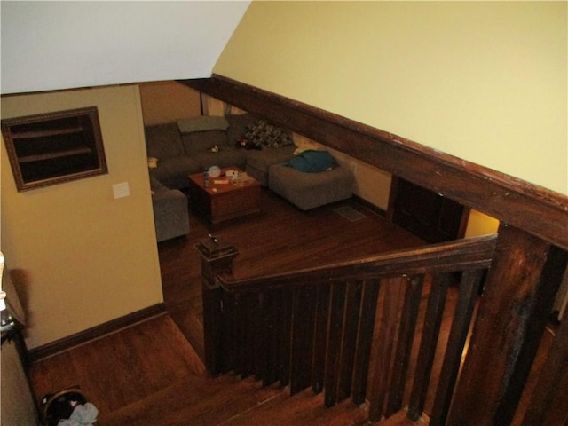 stairs with wood-type flooring