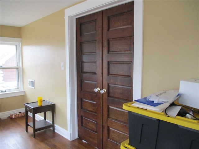 foyer featuring dark hardwood / wood-style floors