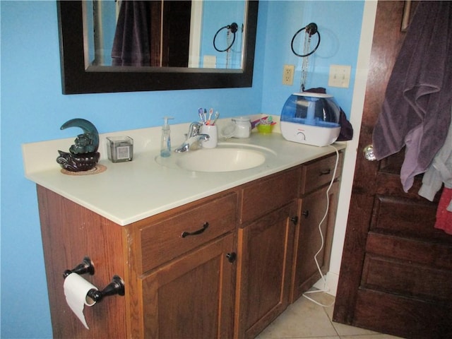 bathroom featuring tile patterned floors and vanity