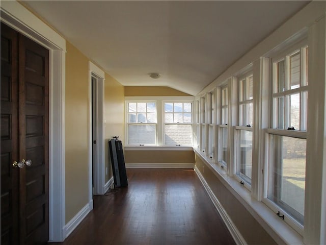 unfurnished sunroom with vaulted ceiling