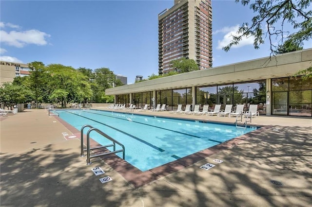 pool with a patio area