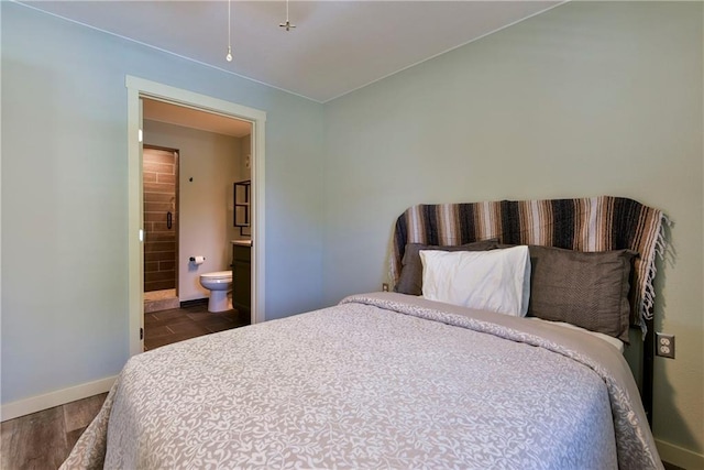 bedroom featuring ensuite bath