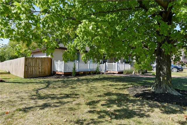view of yard with a deck