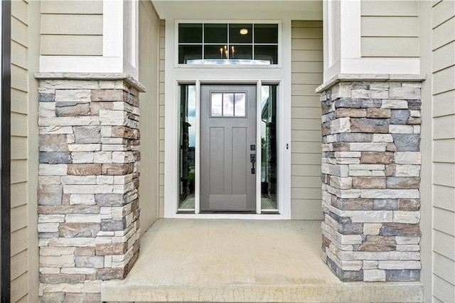 7016 N Polk Ave, Kansas City, MO 64151 - entrance to property featuring a porch and stone siding