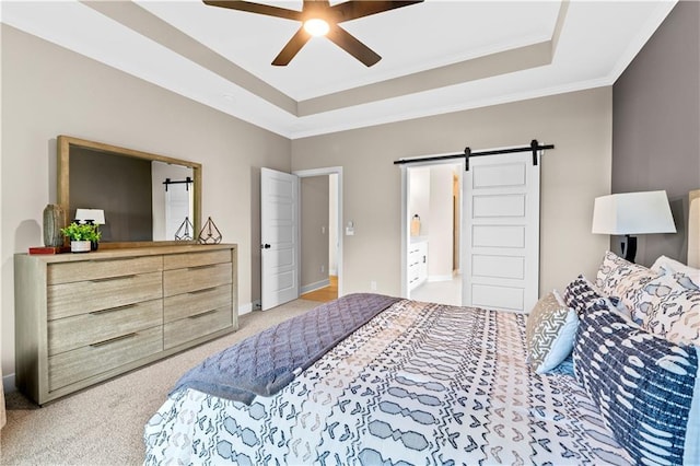 7016 N Polk Ave, Kansas City, MO 64151 - bedroom with a barn door, a raised ceiling, light carpet, and ornamental molding