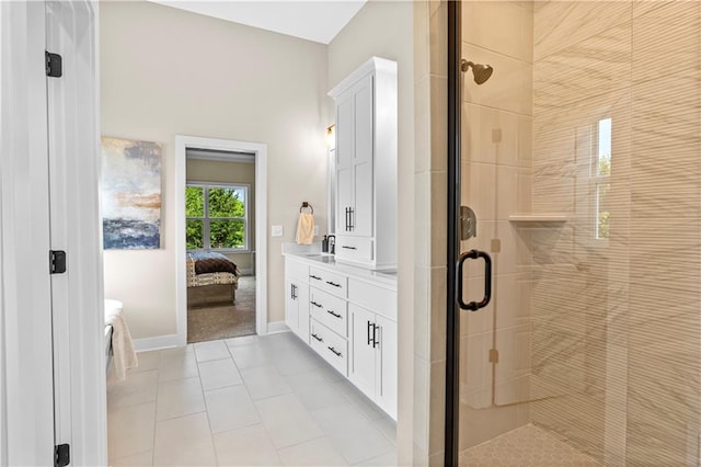 7016 N Polk Ave, Kansas City, MO 64151 - bathroom featuring connected bathroom, a stall shower, vanity, and tile patterned floors