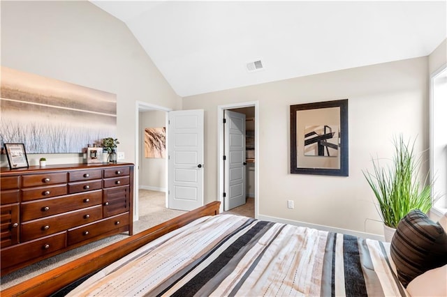 7016 N Polk Ave, Kansas City, MO 64151 - bedroom featuring lofted ceiling, baseboards, and a walk in closet