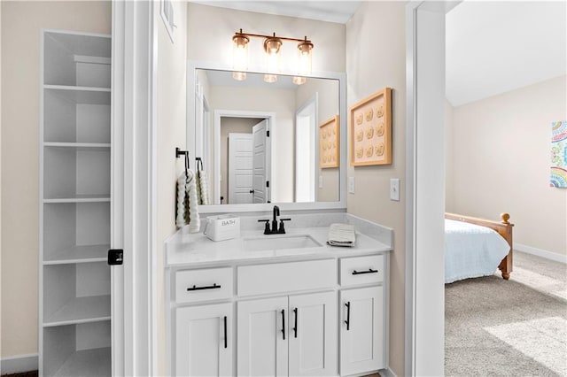 7016 N Polk Ave, Kansas City, MO 64151 - ensuite bathroom with vanity and baseboards
