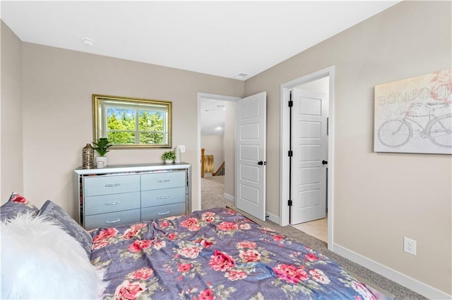 7016 N Polk Ave, Kansas City, MO 64151 - bedroom featuring light colored carpet and baseboards