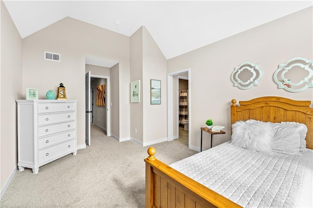 7016 N Polk Ave, Kansas City, MO 64151 - bedroom featuring vaulted ceiling, light colored carpet, and baseboards