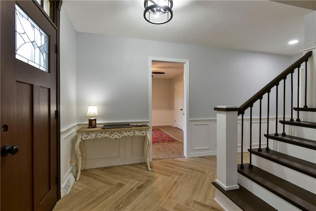 foyer featuring light parquet floors