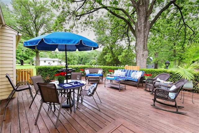 deck with an outdoor hangout area