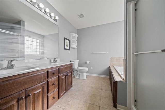 full bathroom featuring vanity, toilet, separate shower and tub, and tile patterned flooring