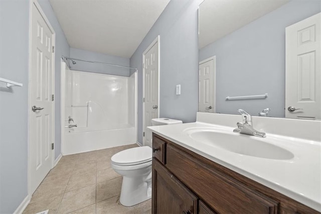 full bathroom featuring vanity, shower / washtub combination, toilet, and tile patterned flooring