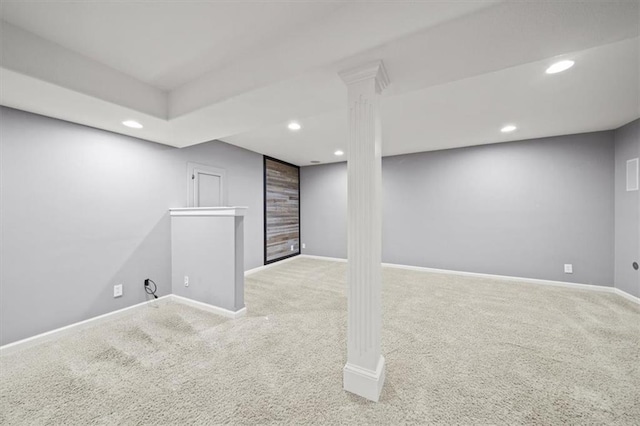 basement featuring light colored carpet