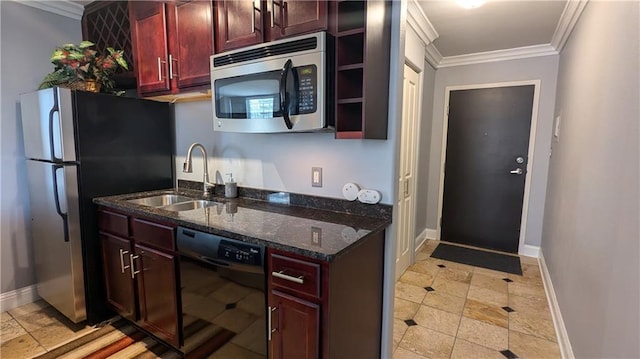 kitchen featuring ornamental molding, appliances with stainless steel finishes, sink, and dark stone counters