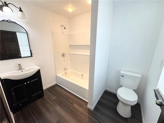 full bathroom featuring shower / bathtub combination, hardwood / wood-style flooring, vanity, and toilet