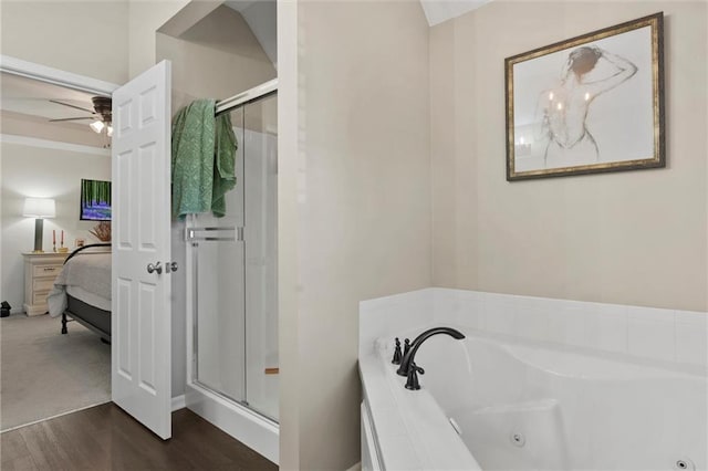 bathroom featuring wood-type flooring, separate shower and tub, and ceiling fan