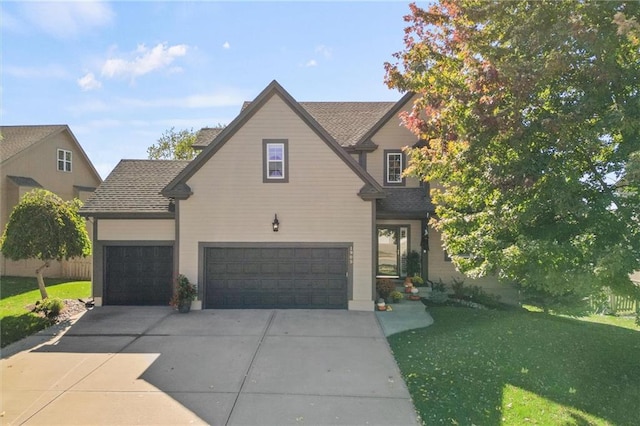 view of front facade featuring a front lawn and a garage