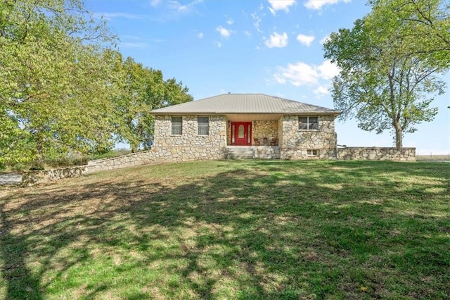 view of front of property with a front lawn