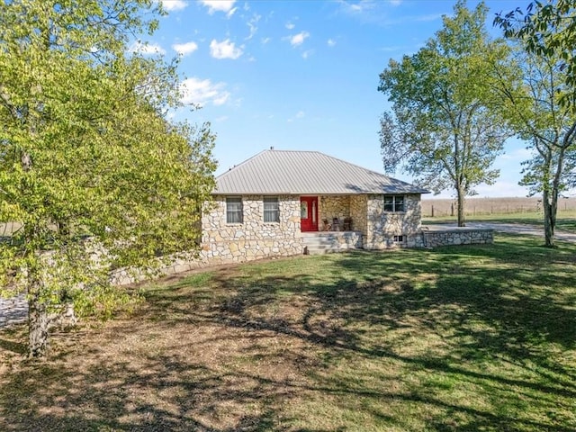 exterior space featuring a front lawn