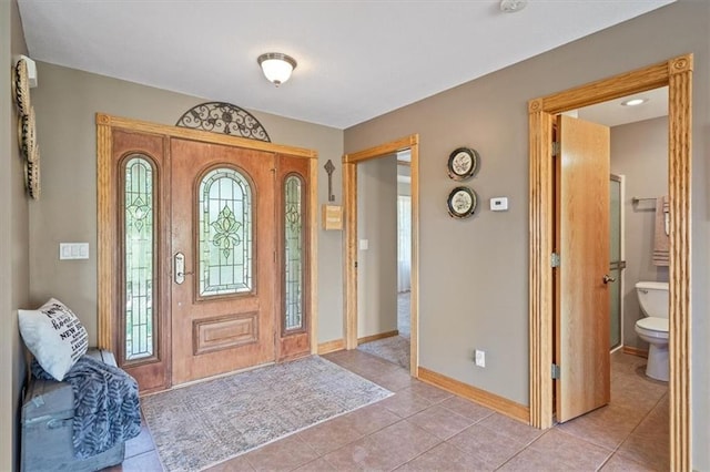 entrance foyer featuring light tile patterned floors