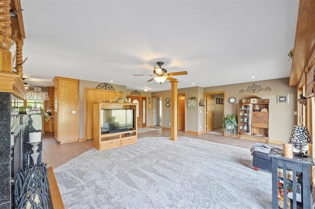 living room featuring ceiling fan