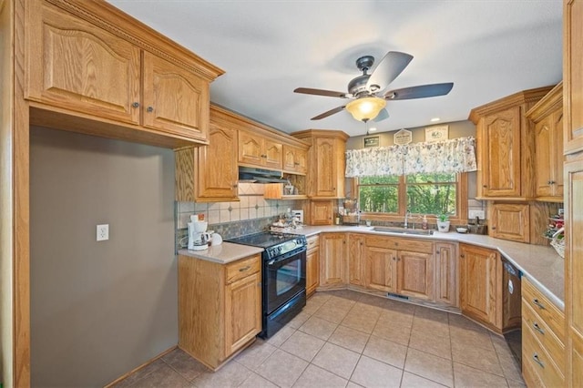 kitchen featuring light tile patterned flooring, black appliances, decorative backsplash, and sink