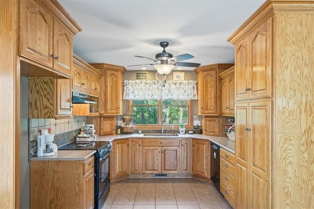 kitchen with tile patterned flooring, ceiling fan, tasteful backsplash, sink, and black appliances