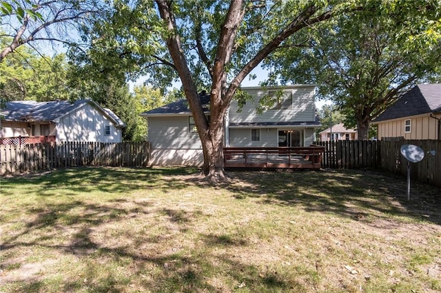 view of yard featuring a wooden deck