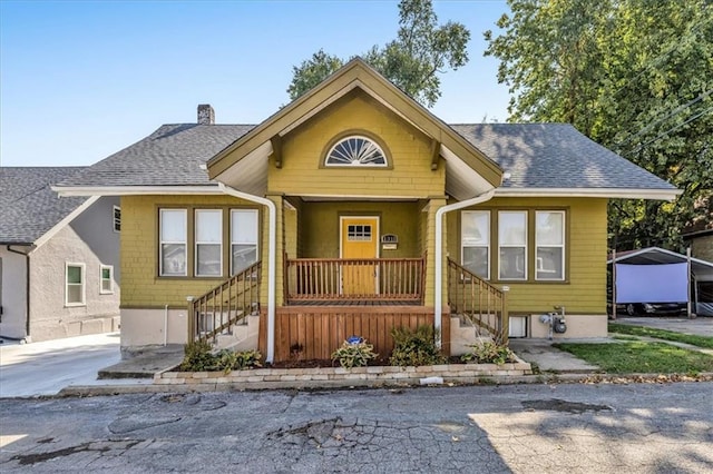 bungalow-style home featuring covered porch