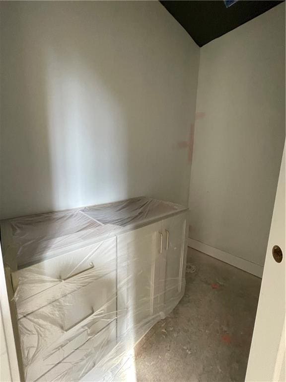 unfurnished bedroom with baseboards