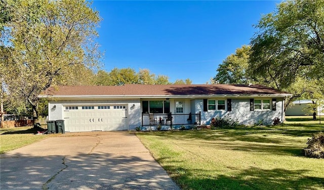 single story home featuring a garage, a porch, and a front yard