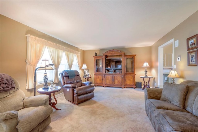 living room featuring light carpet