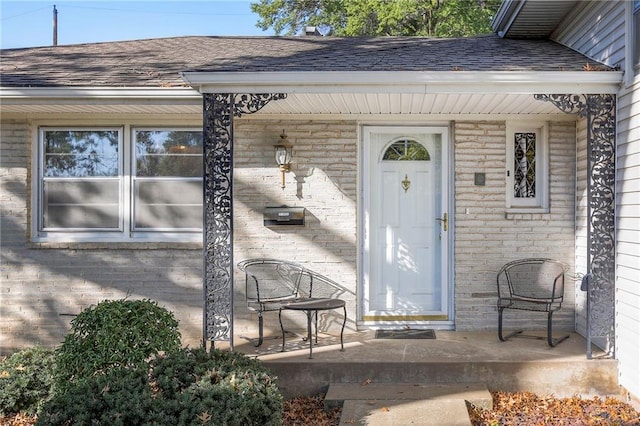 doorway to property with a porch