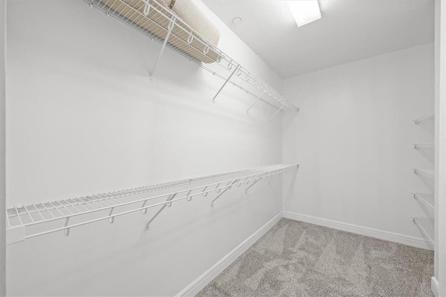 1101 Walnut St Unit 605, Kansas City, MO 64106 - spacious closet featuring carpet floors