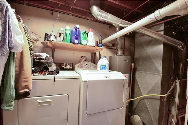 laundry room with water heater, heating unit, and separate washer and dryer