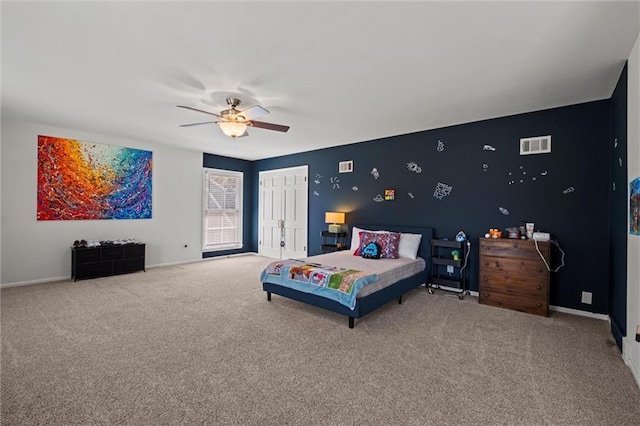 carpeted bedroom featuring ceiling fan