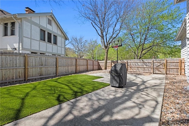 view of patio with a grill