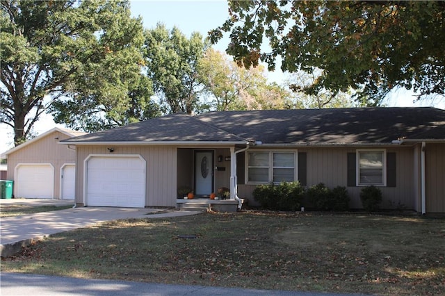 ranch-style home featuring a garage